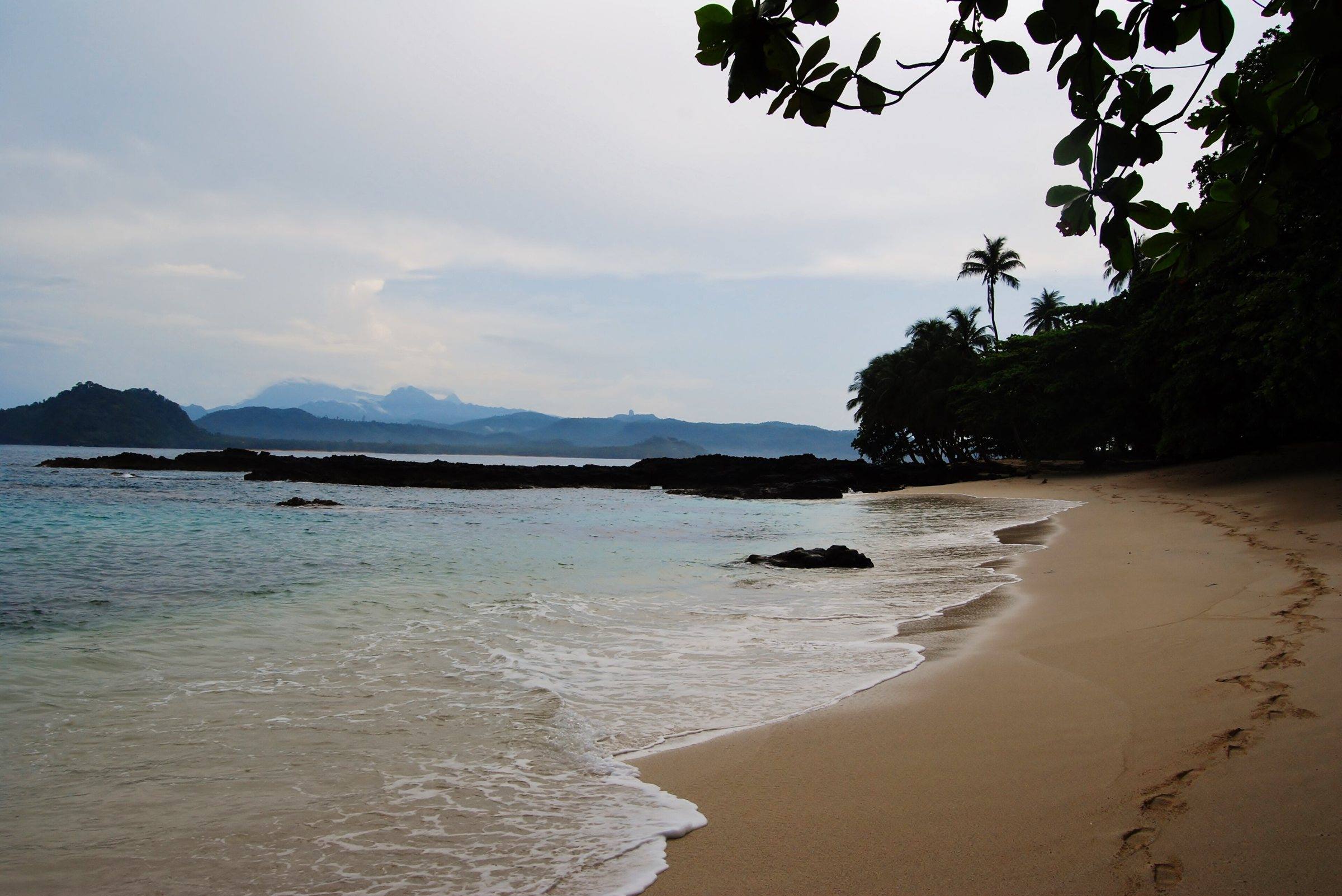 A quiet sandy beach on Ilhéu das Rolas